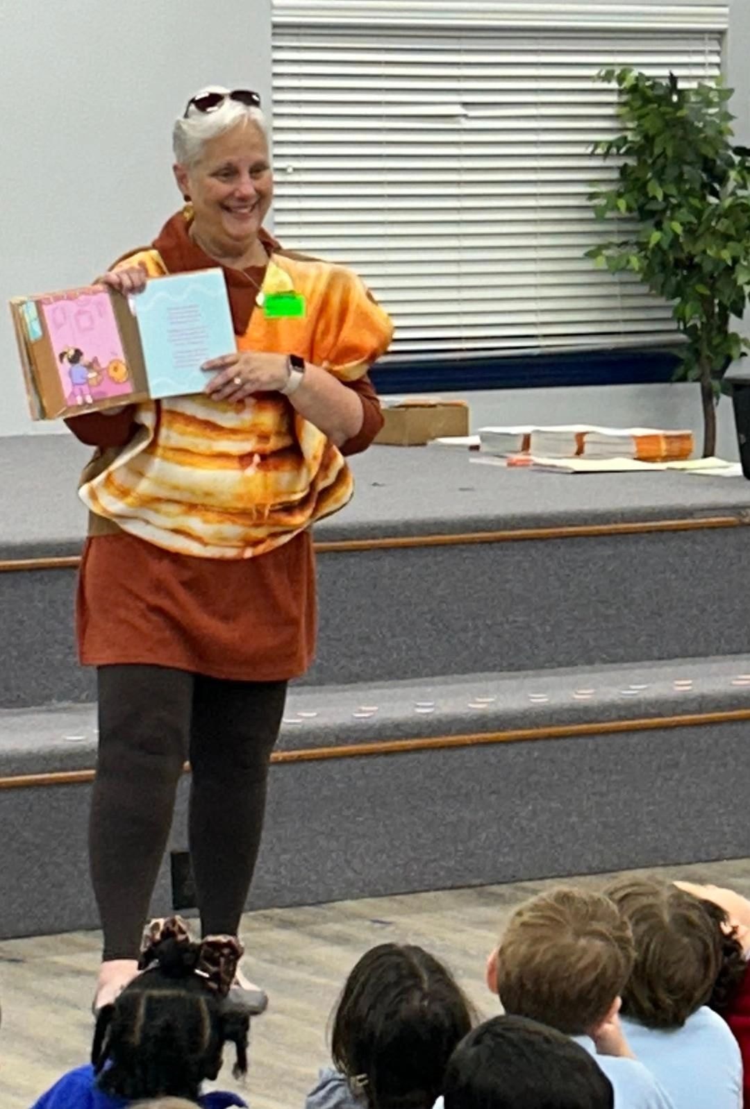 Mary T reading to children