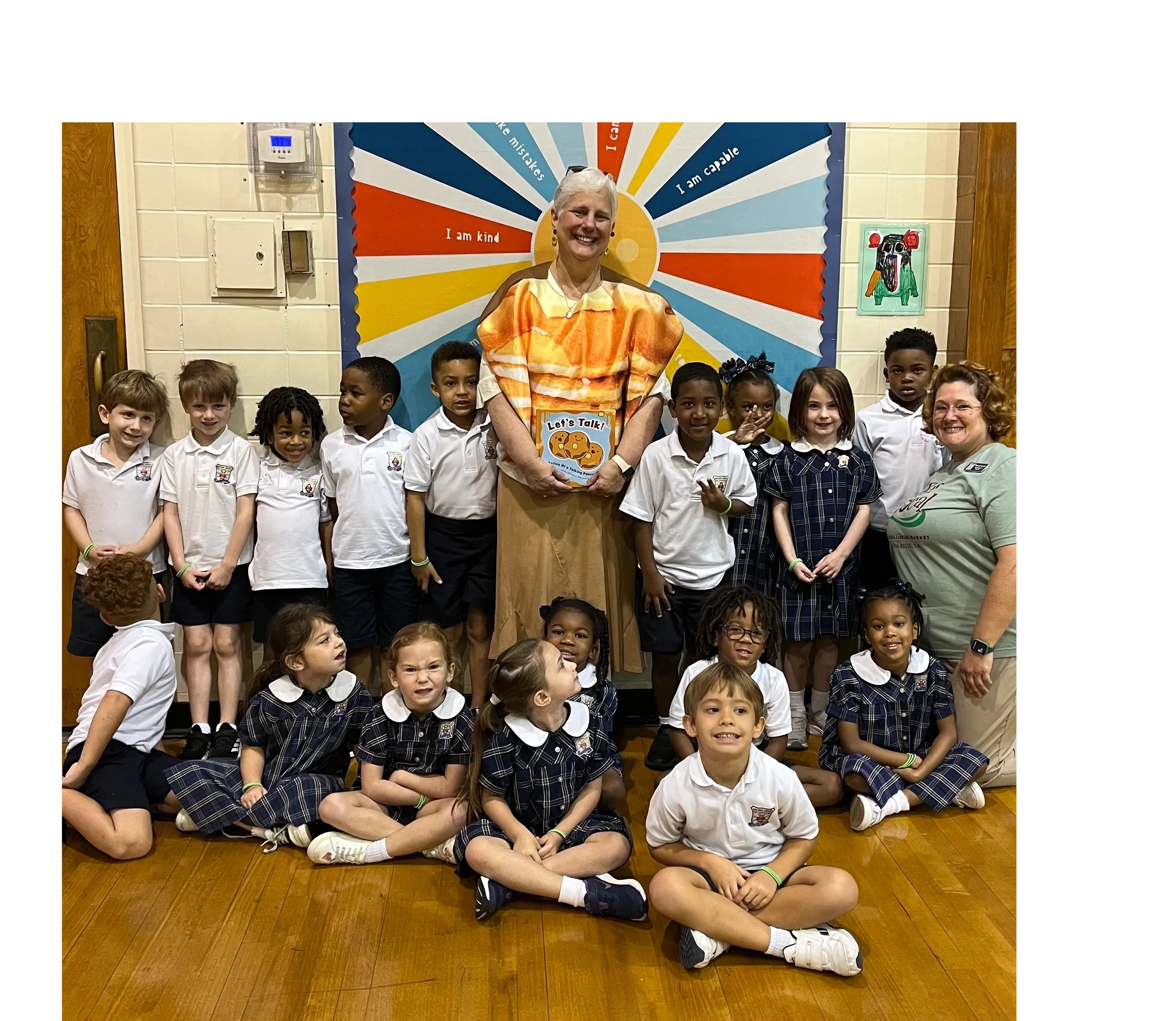 Author with children at school